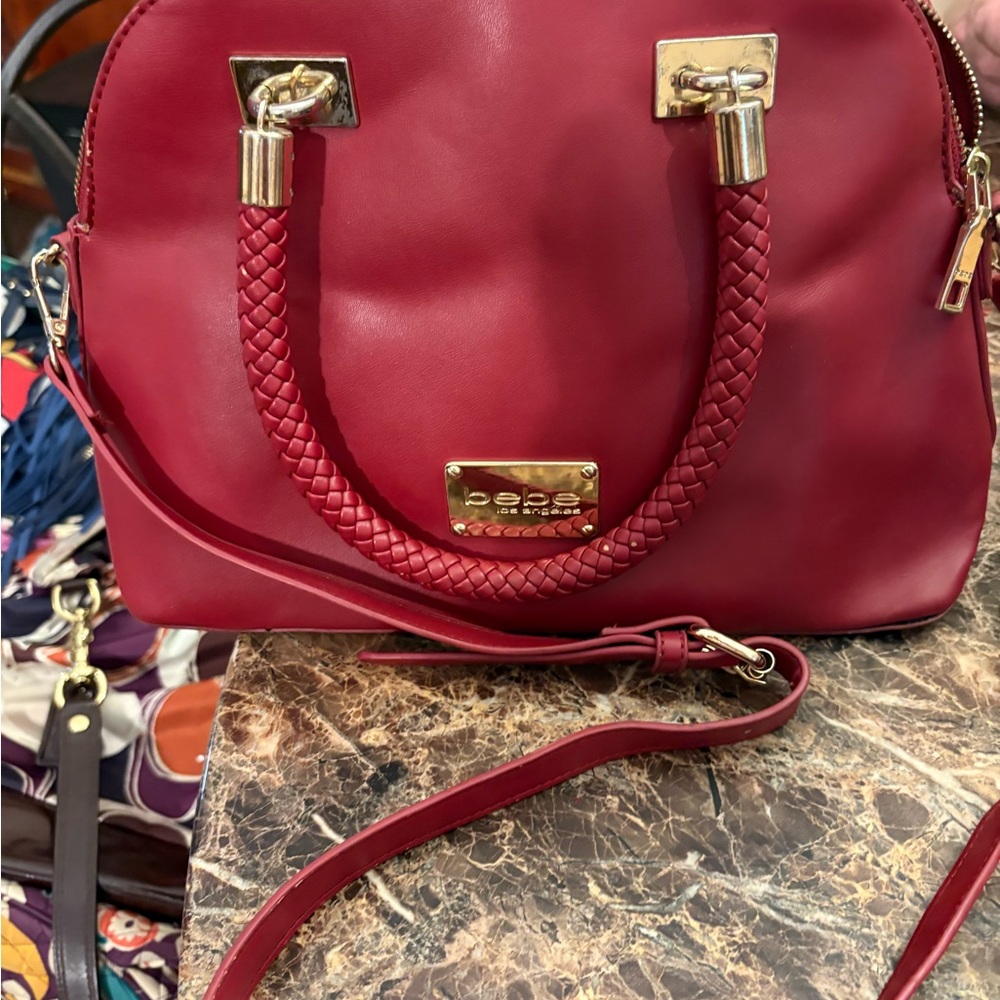 bebe Burgundy Satchel with Gold Accents